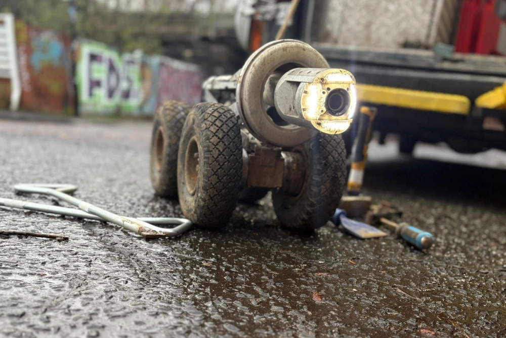 Close-up of a CCTV Drainage Survey system on the path