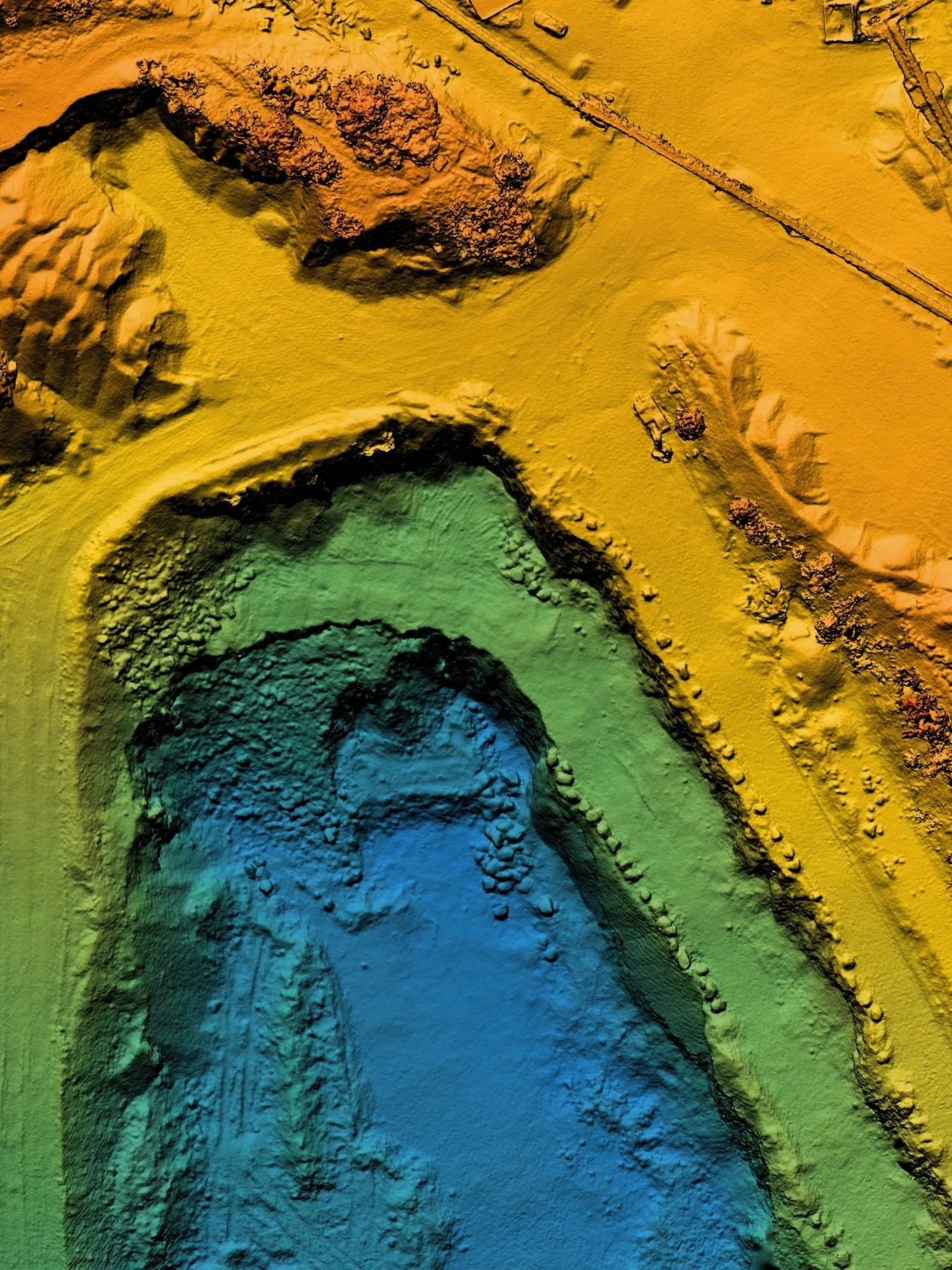 A LiDAR survey of a large excavated area in blue and orange.
