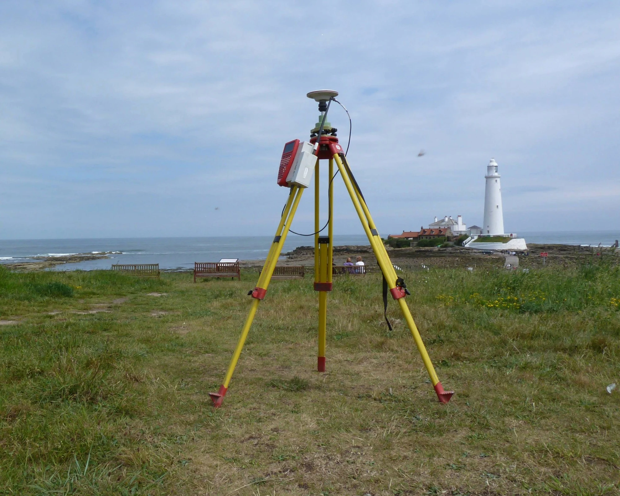 The Leica SR530 GNSS with St Mary's Lighthouse in the background.