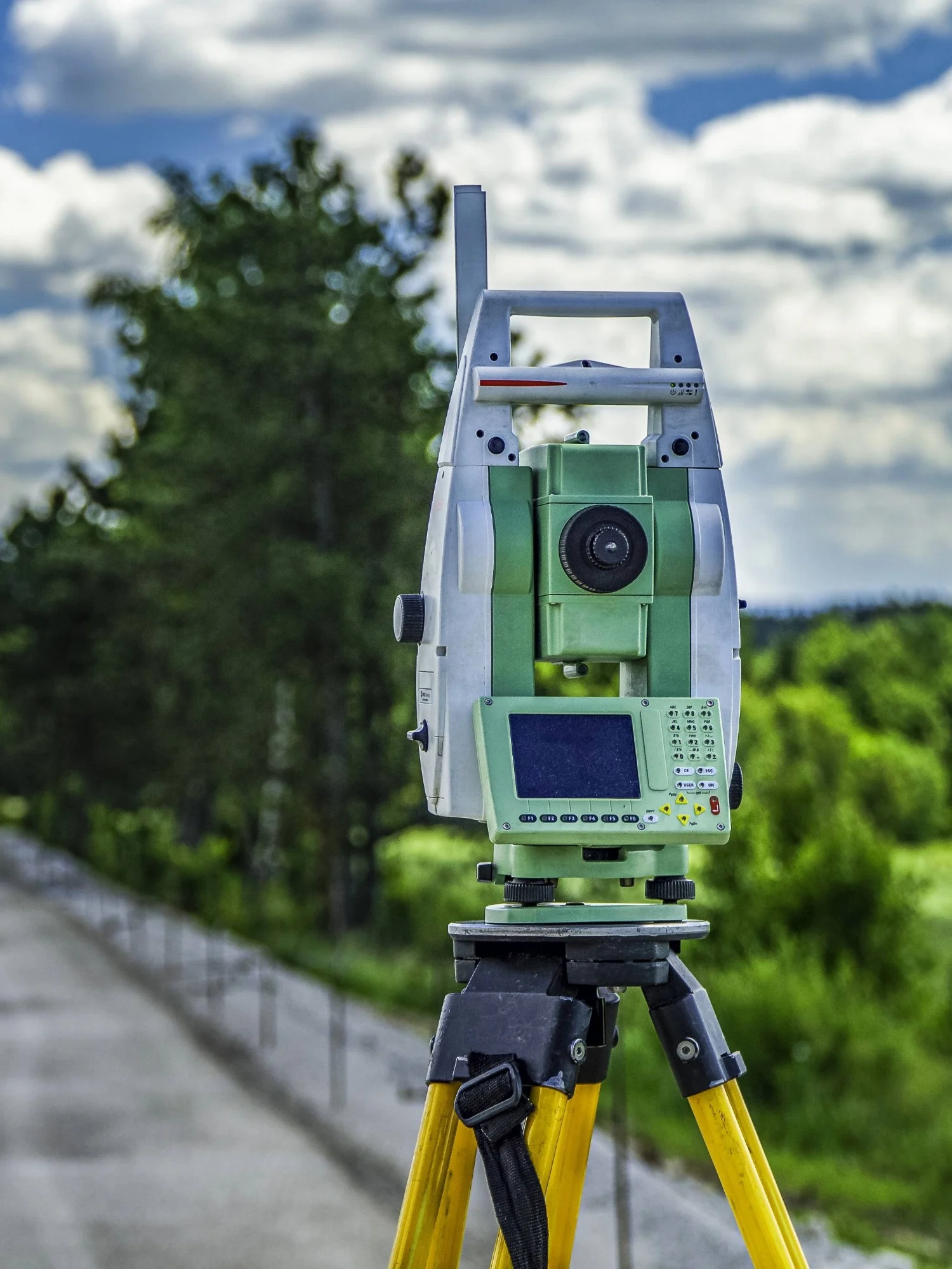 Topographical survey equipment on a motorway.