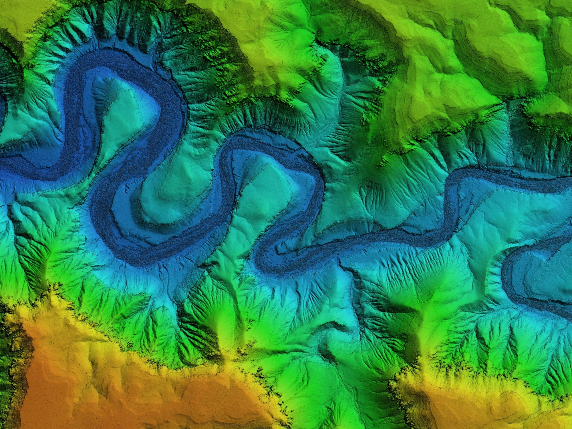 Digital results rom a LiDAR survey, showcasing a winding river and surrounding area in blue, orange, yellow and green.